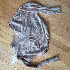 Cropped long sleeve sweater with twist back